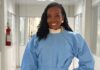9 médicas negras para acompanhar nas redes sociais Thelminha usando uniforme médico